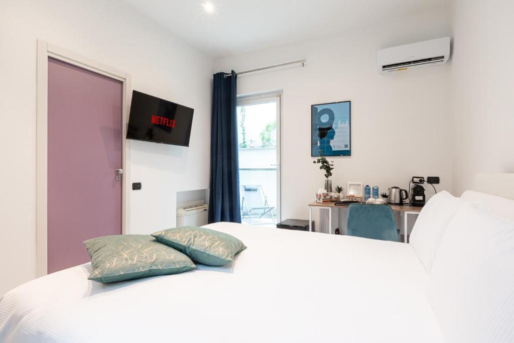 Postel nebo postele na pokoji v ubytování Città Studi Suites 1 - Top Collection