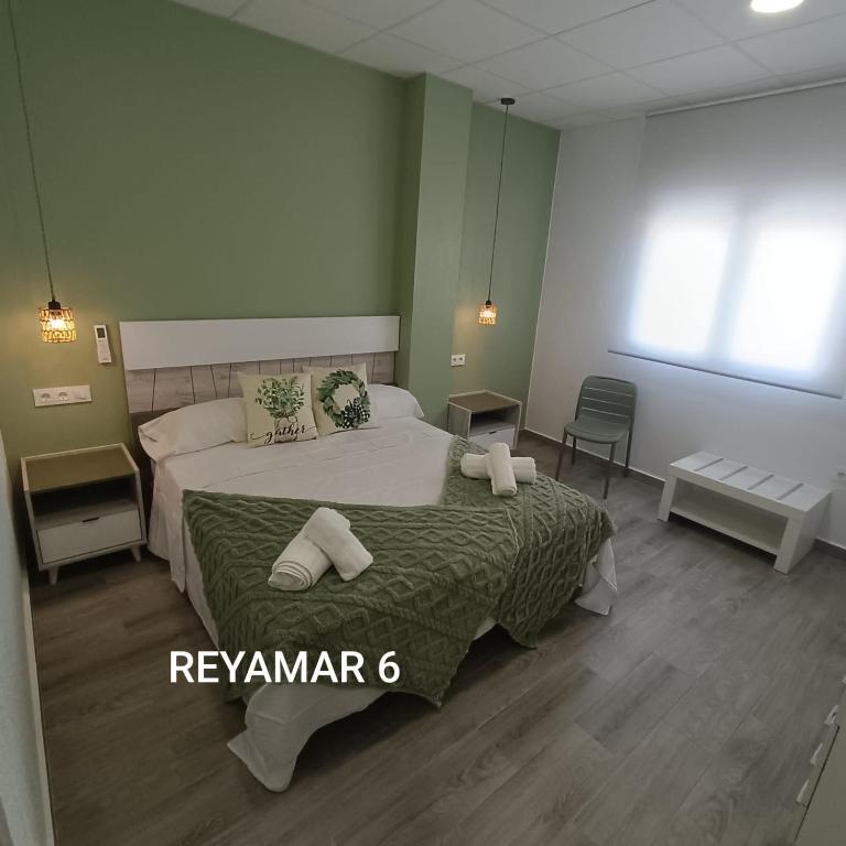 Postel nebo postele na pokoji v ubytování Apartamentos Reyamar