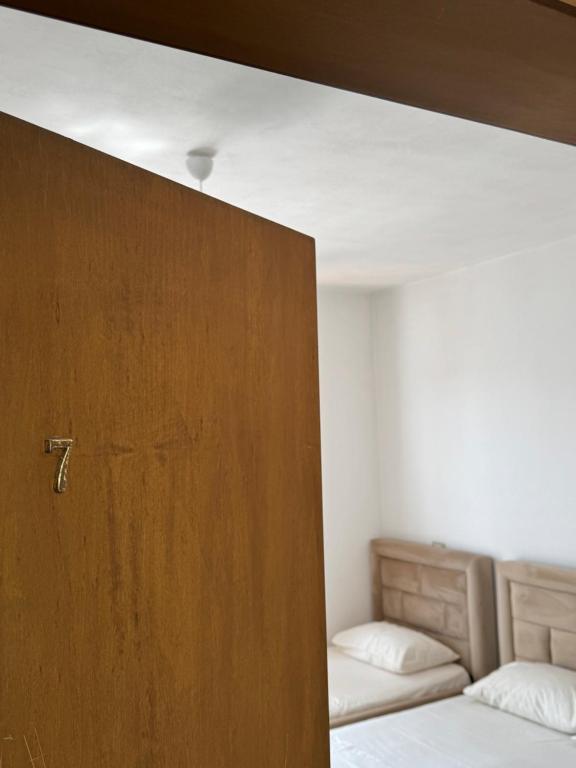 Postel nebo postele na pokoji v ubytování GuestHouse Cami