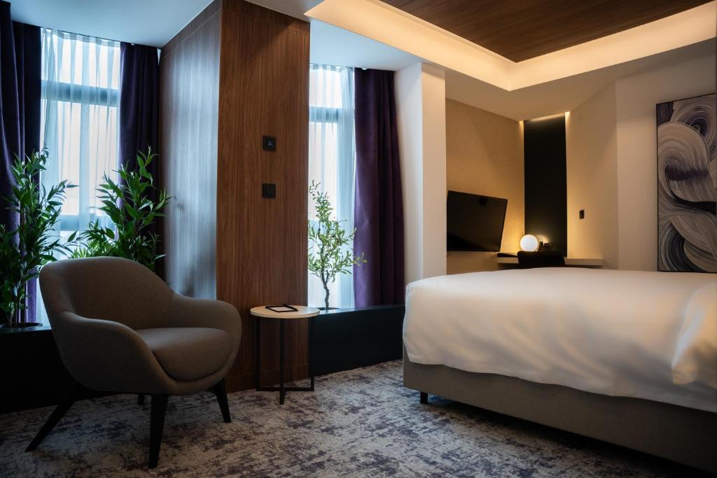 Postel nebo postele na pokoji v ubytování Hotel Rubin DHS