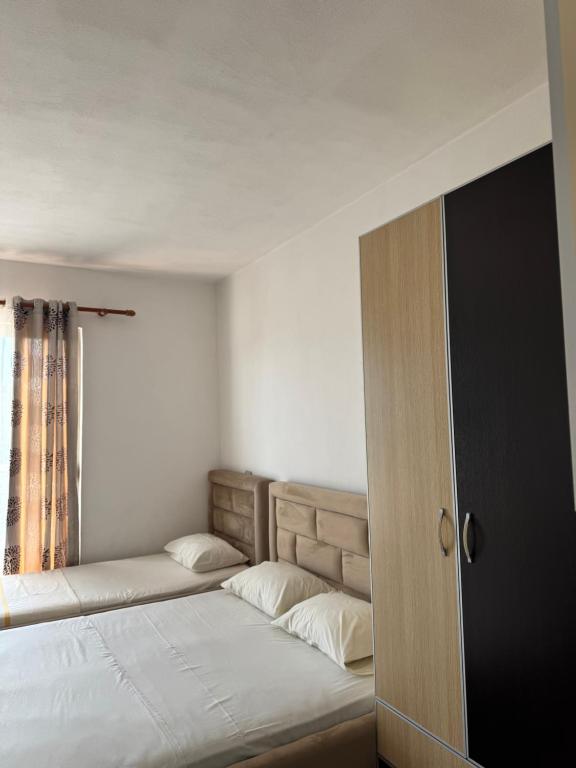 Postel nebo postele na pokoji v ubytování GuestHouse Cami