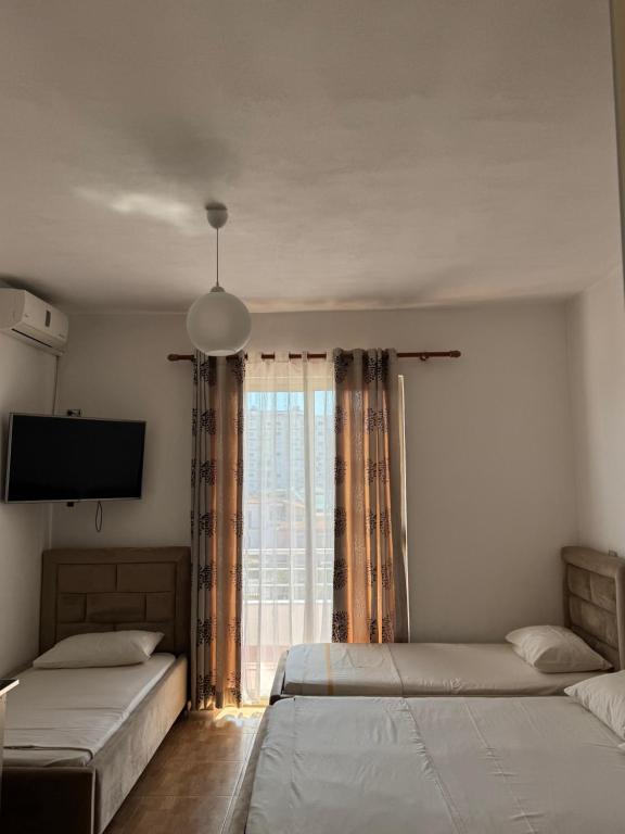 Postel nebo postele na pokoji v ubytování GuestHouse Cami