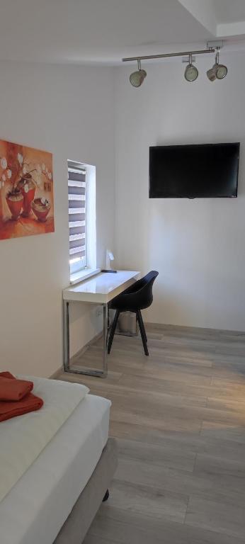 TV a/nebo společenská místnost v ubytování Hotel Link