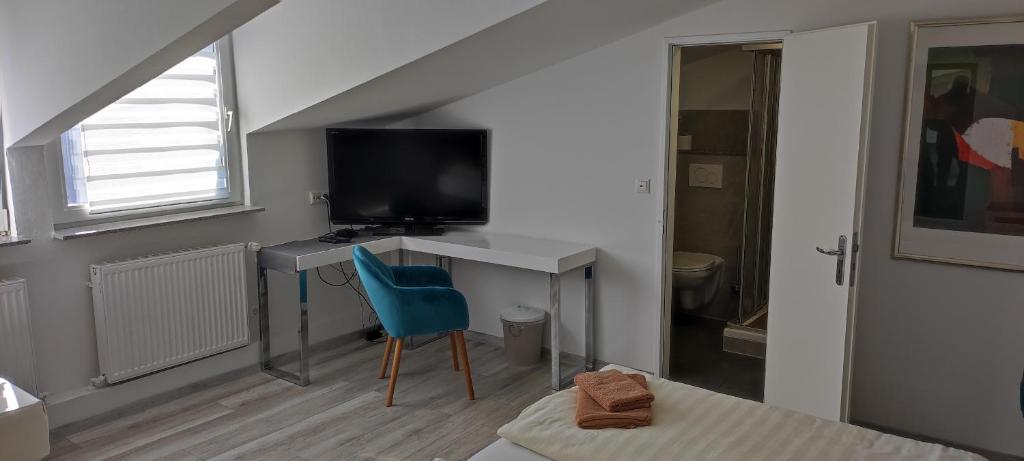 TV a/nebo společenská místnost v ubytování Hotel Link