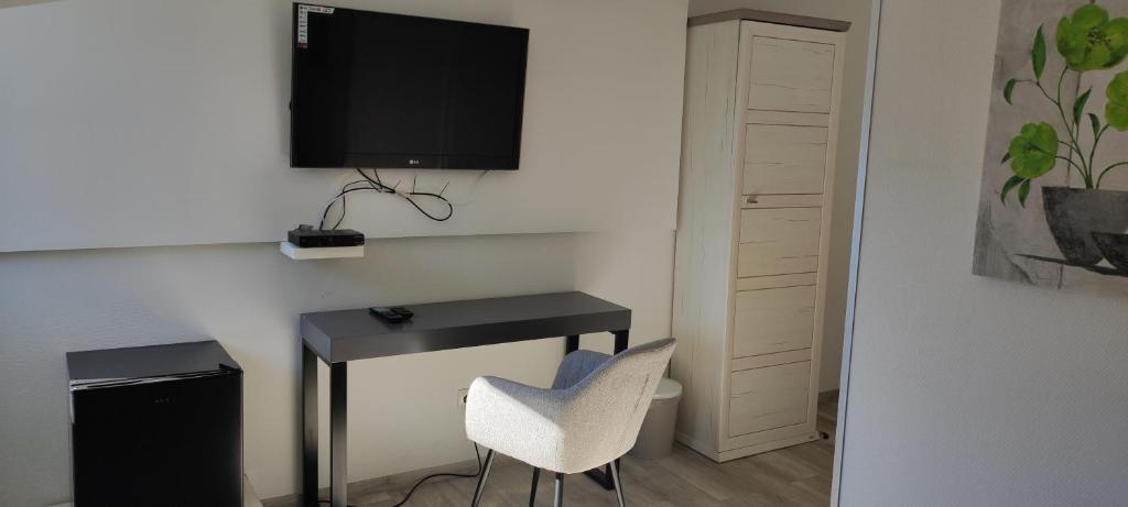 TV a/nebo společenská místnost v ubytování Hotel Link