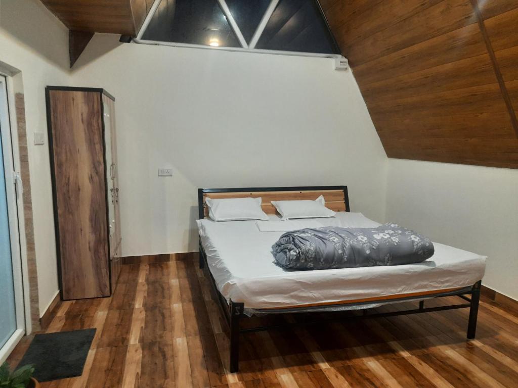 Postel nebo postele na pokoji v ubytování A Frame