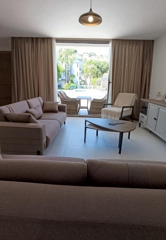 Posezení v ubytování Queen Residences & Apart Hotel