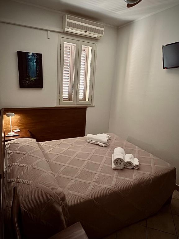 Postel nebo postele na pokoji v ubytování Freya Rooms