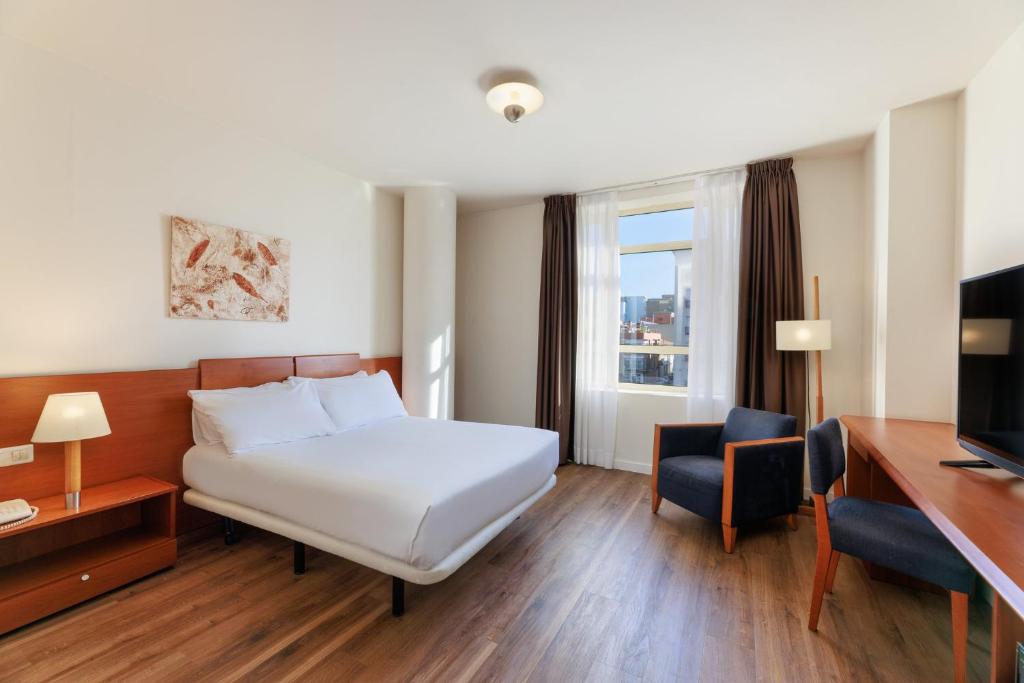 Posteľ alebo postele v izbe v ubytovaní Sercotel Arrahona Sabadell