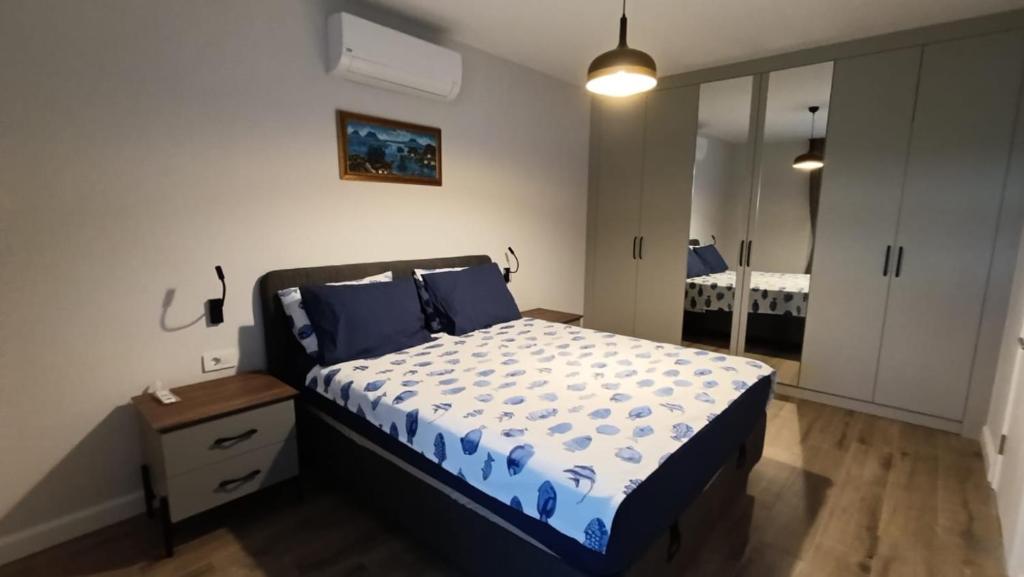 Postel nebo postele na pokoji v ubytování Queen Residences & Apart Hotel