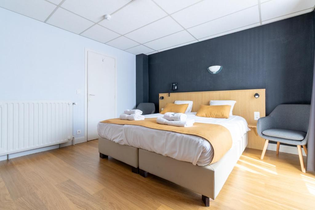 Postel nebo postele na pokoji v ubytování Hotel Montovani