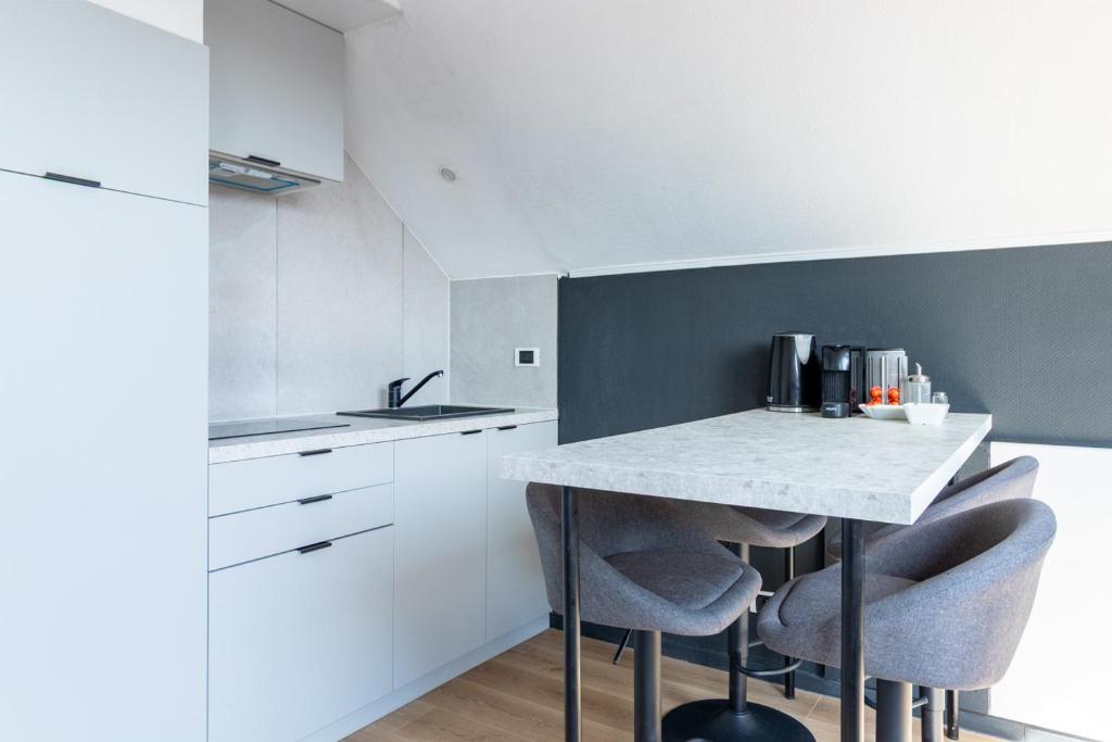 Kuchyň nebo kuchyňský kout v ubytování Hotel Montovani