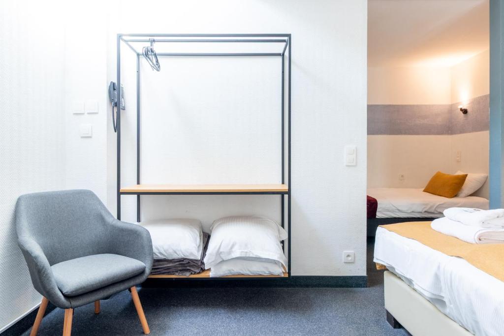 Postel nebo postele na pokoji v ubytování Hotel Montovani