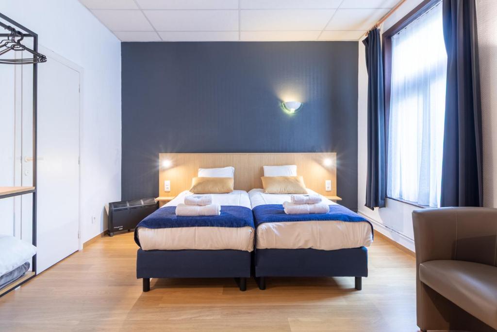 Postel nebo postele na pokoji v ubytování Hotel Montovani
