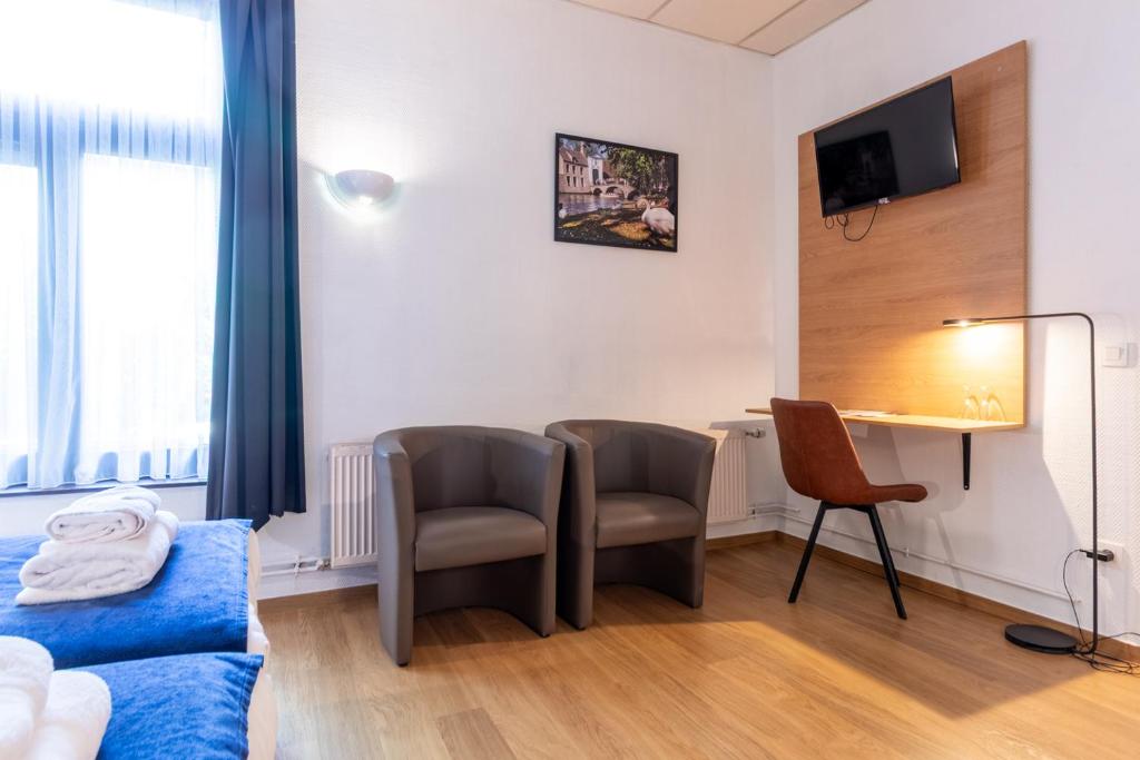 TV a/nebo společenská místnost v ubytování Hotel Montovani