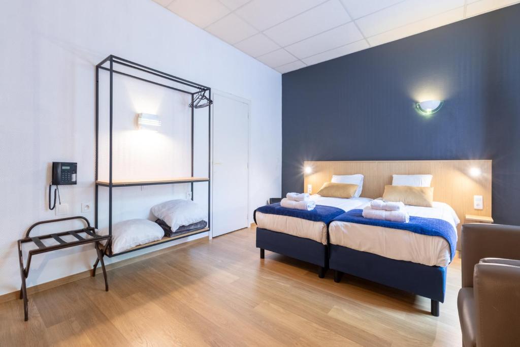 Postel nebo postele na pokoji v ubytování Hotel Montovani