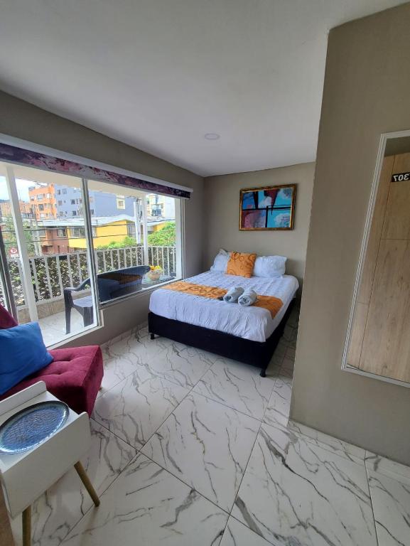 Postel nebo postele na pokoji v ubytování HOTEL LUXEM