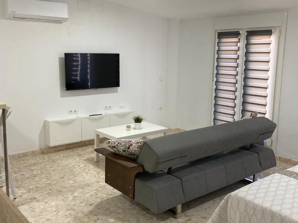 Televízia a/alebo spoločenská miestnosť v ubytovaní Apartamento Mirador del Tinto centro ciudad