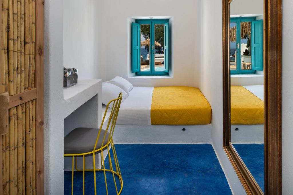 Postel nebo postele na pokoji v ubytování Nissia Beach Apartments & Suites