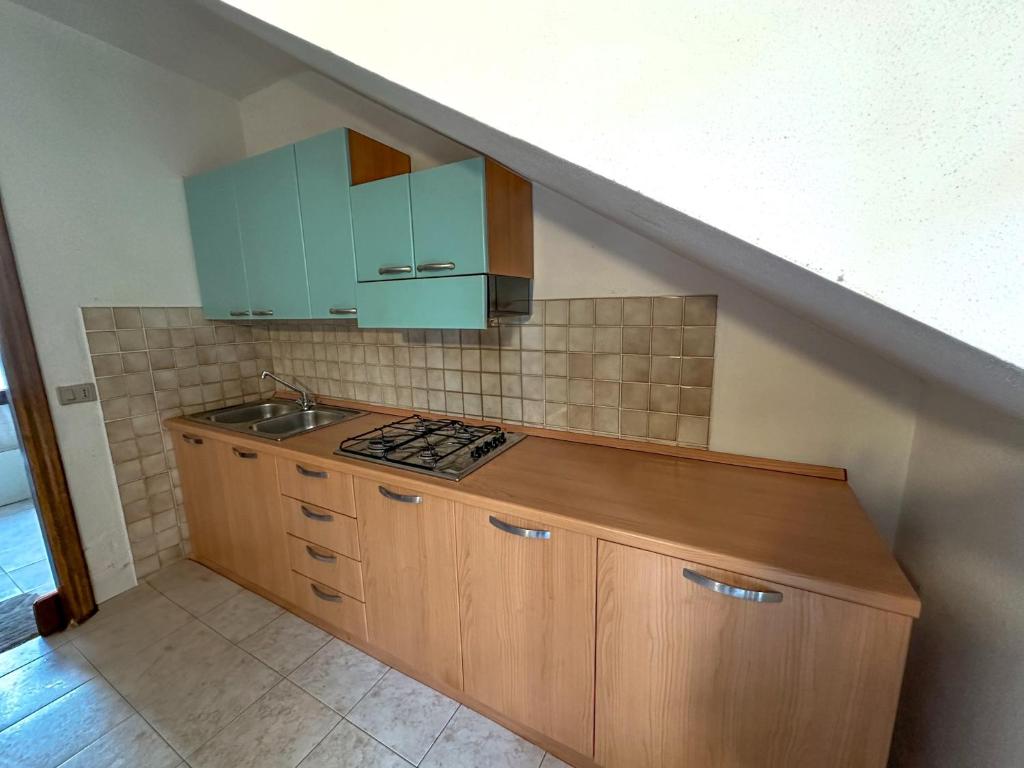 A kitchen or kitchenette at Appartamenti San Teodoro