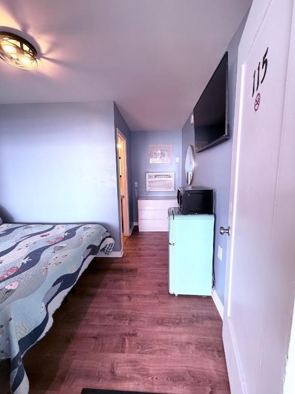 Postel nebo postele na pokoji v ubytování Twilight Motel