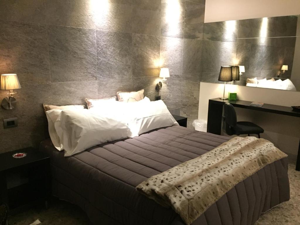 Posteľ alebo postele v izbe v ubytovaní Guest House 38 Monopoli