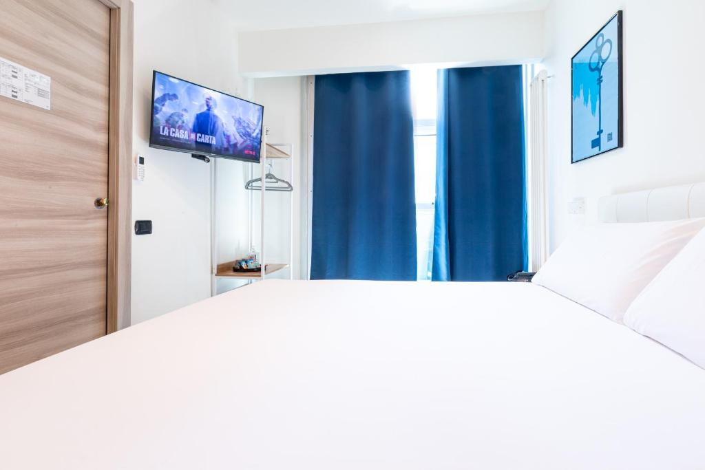 Postel nebo postele na pokoji v ubytování Città Studi Suites 1 - Top Collection