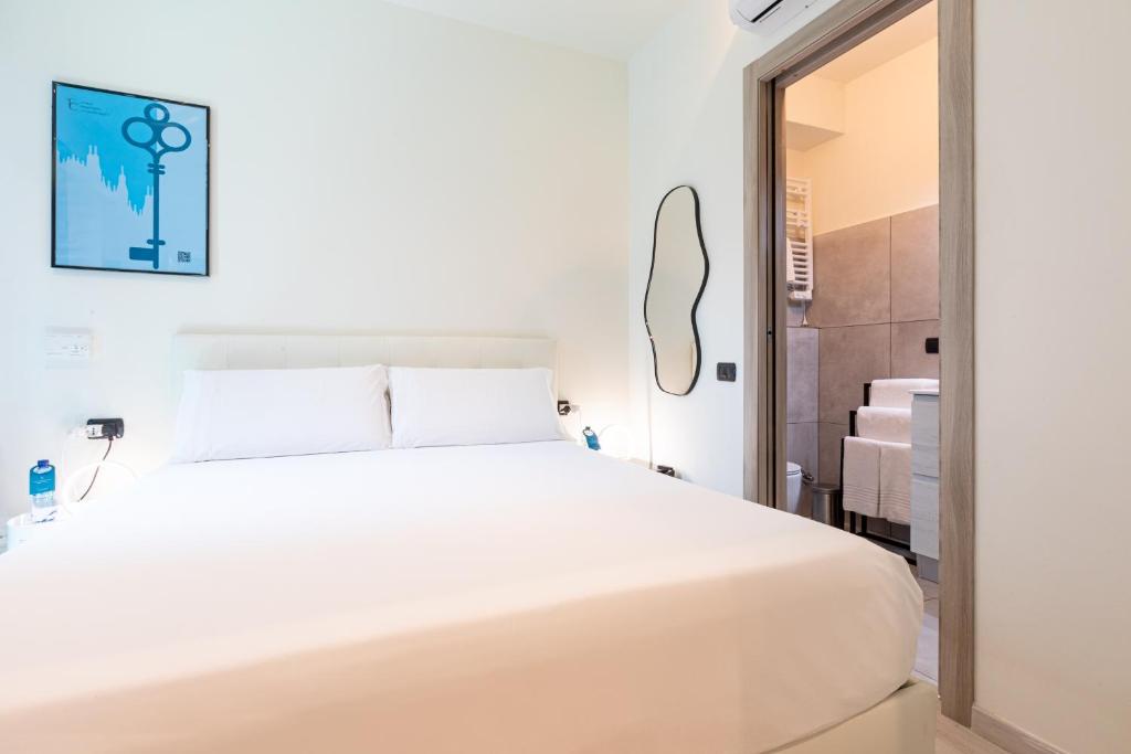 Postel nebo postele na pokoji v ubytování Città Studi Suites 1 - Top Collection