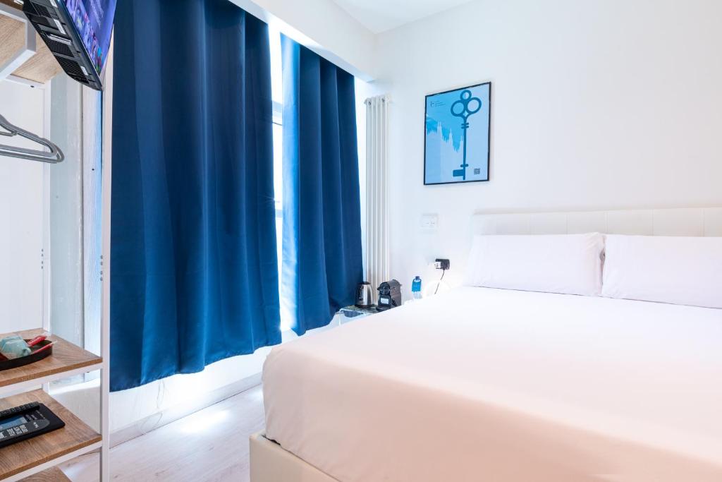 Postel nebo postele na pokoji v ubytování Città Studi Suites 1 - Top Collection