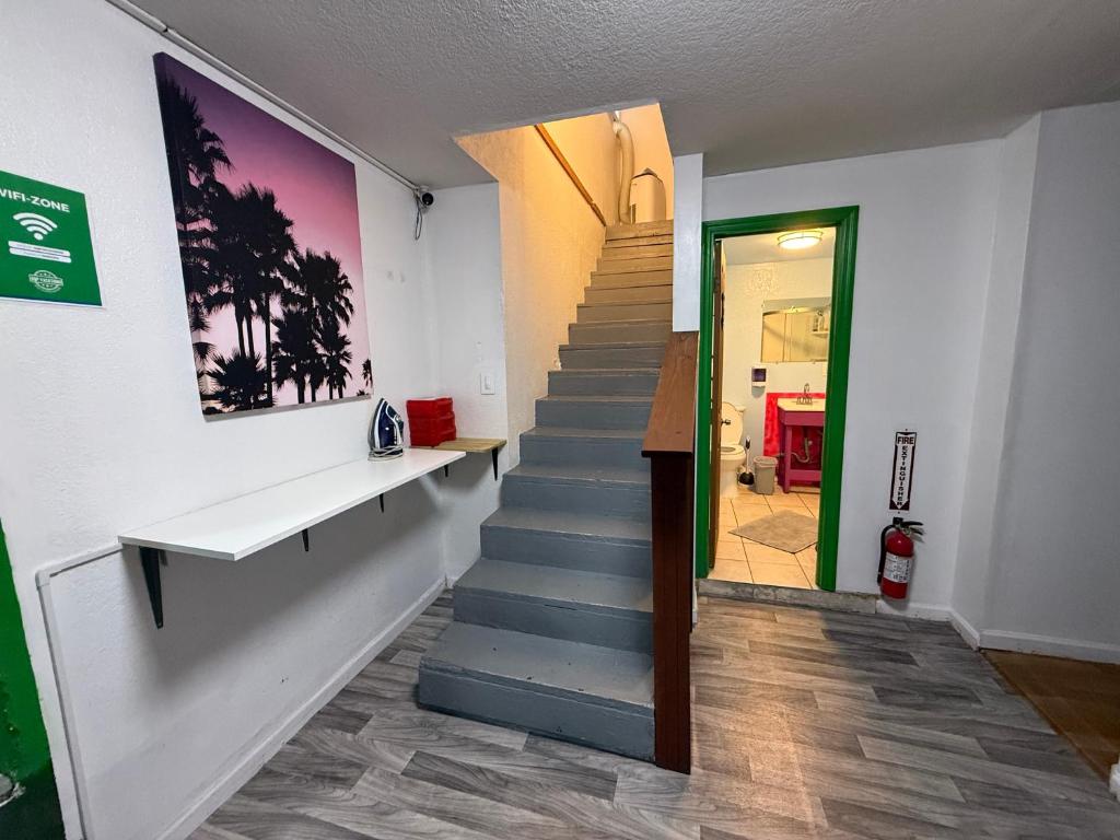 a staircase in a room with a stair case at OQP Vacations in Miami