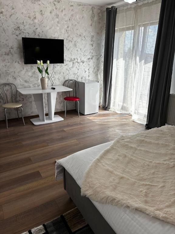 Postel nebo postele na pokoji v ubytování Muller Residence