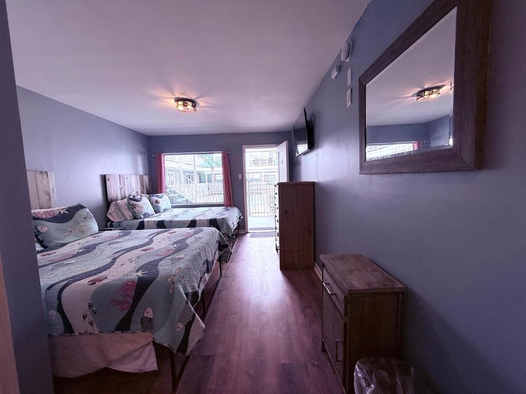 Postel nebo postele na pokoji v ubytování Twilight Motel