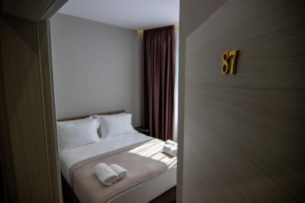 Postel nebo postele na pokoji v ubytování Santa Maria, Vila Cerloj