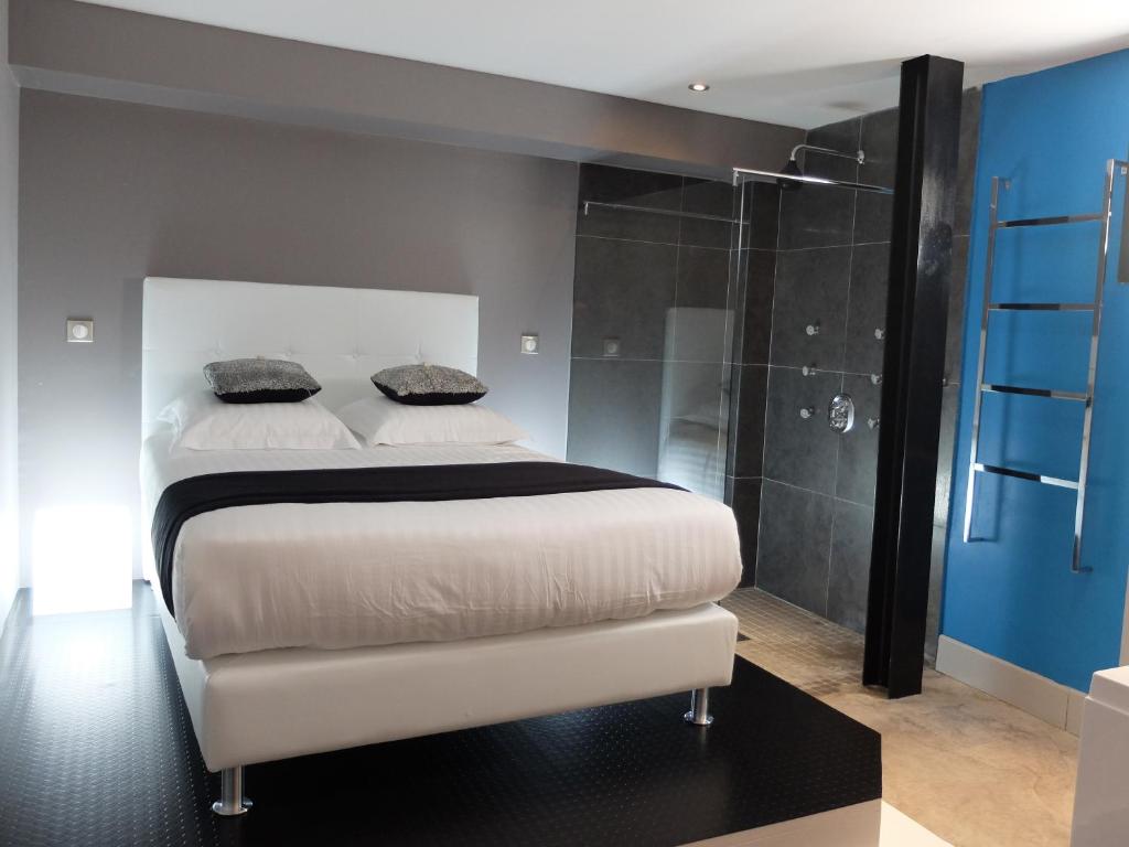 Postel nebo postele na pokoji v ubytování Be Loft B&B Pool & Spa