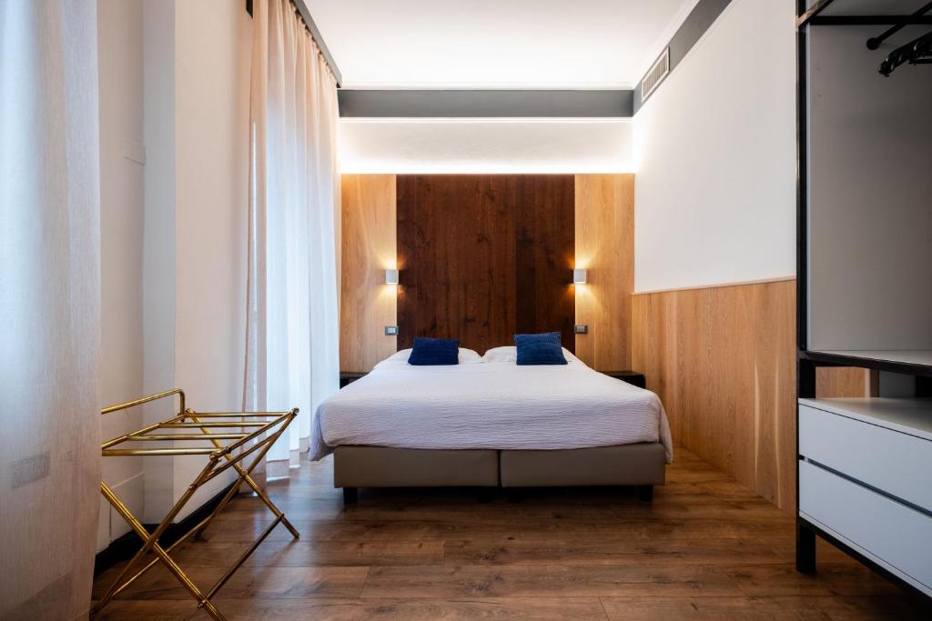 Postel nebo postele na pokoji v ubytování Hotel Italia