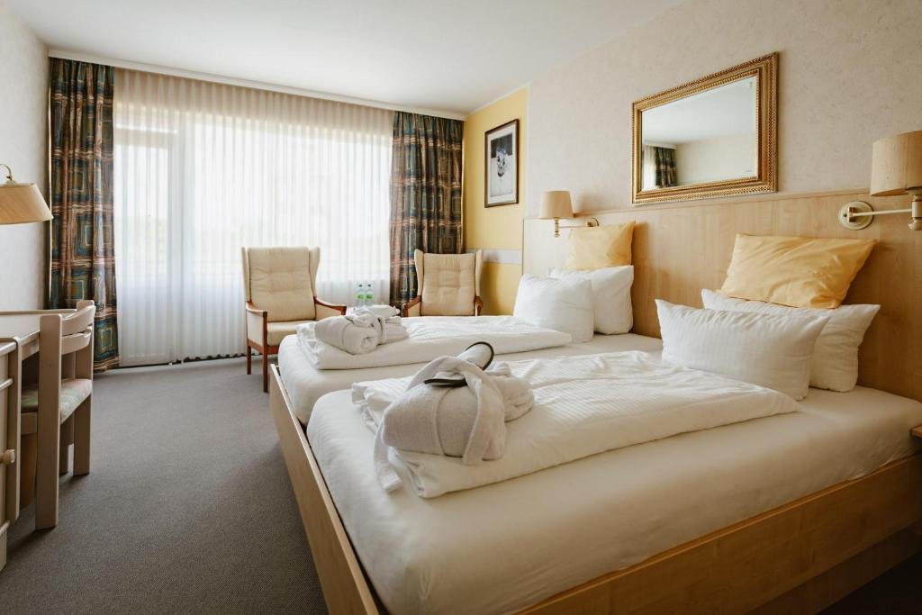 Postel nebo postele na pokoji v ubytování Hotel das Miramar