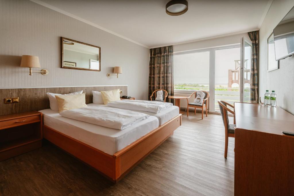 Postel nebo postele na pokoji v ubytování Hotel das Miramar