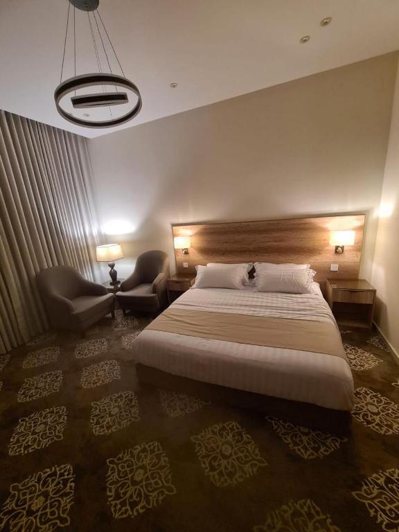 Postel nebo postele na pokoji v ubytování مسك المدينة للوحدات السكنية