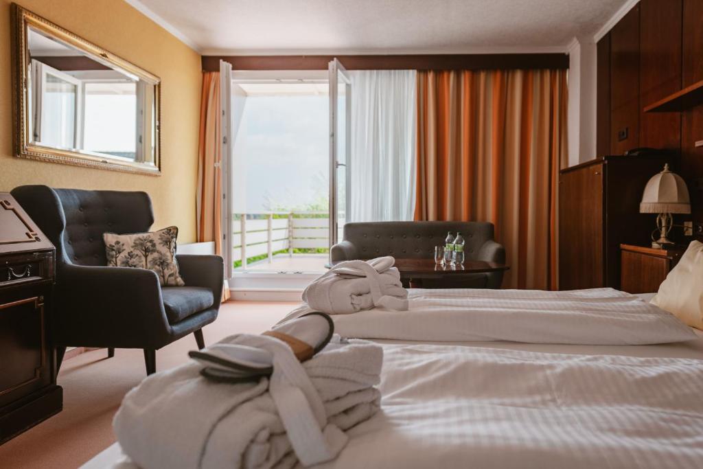 Postel nebo postele na pokoji v ubytování Hotel das Miramar