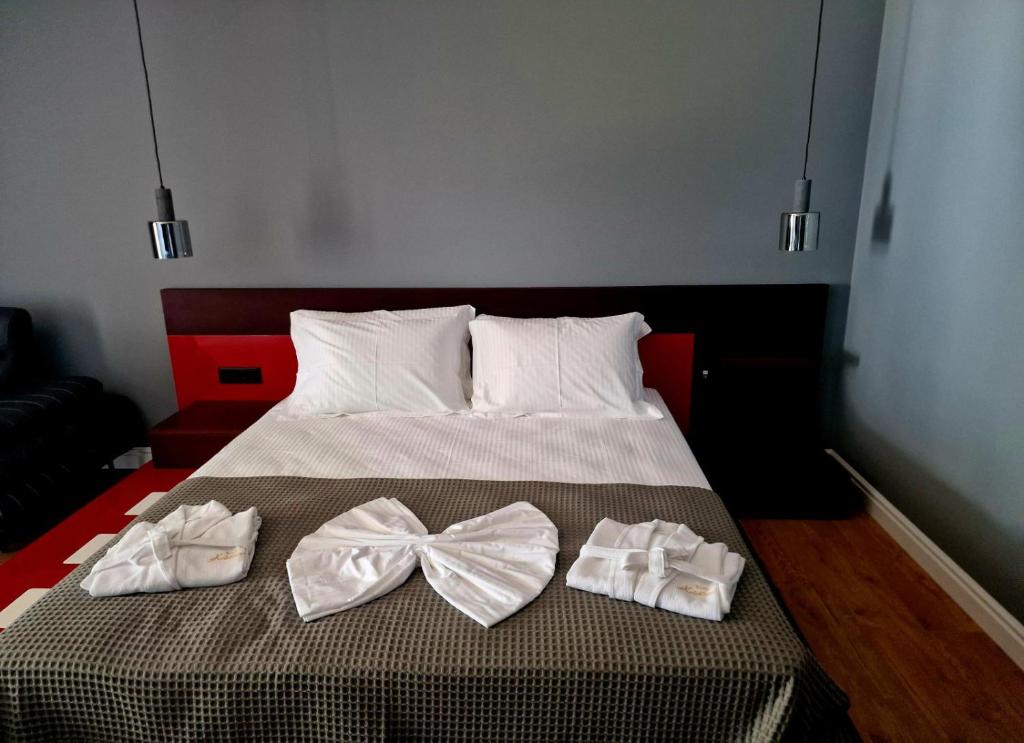 Postel nebo postele na pokoji v ubytování Villa Kristiano 21