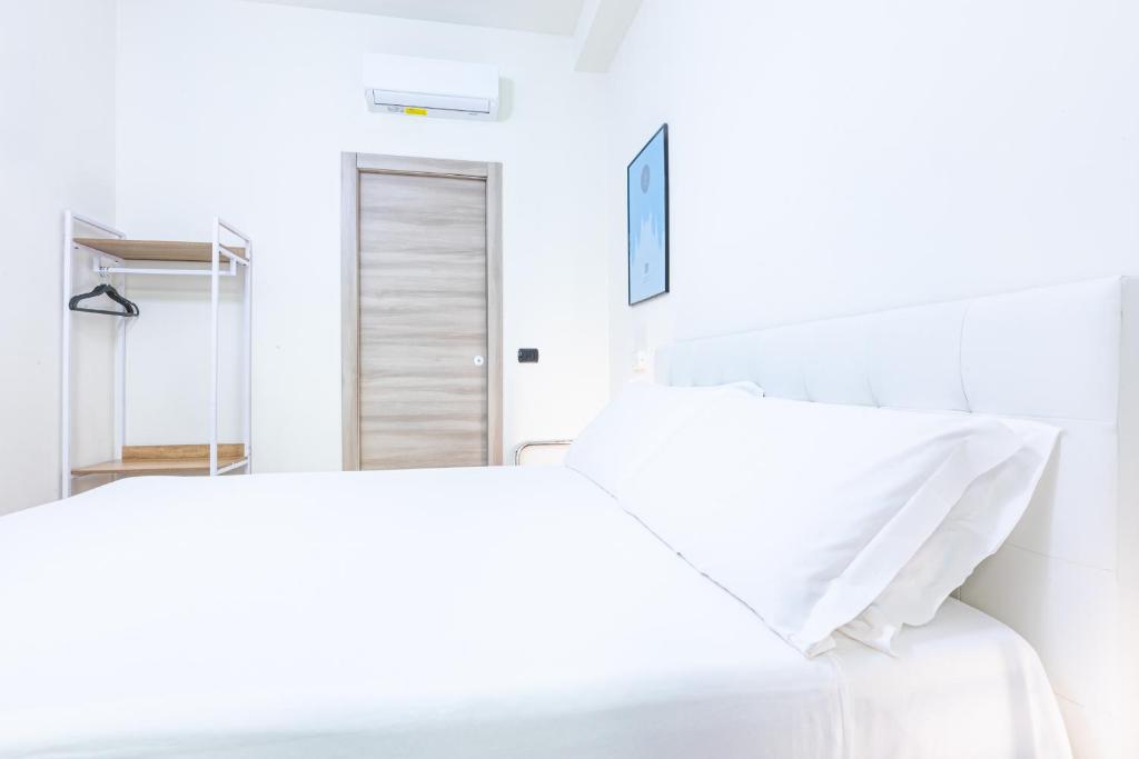 Postel nebo postele na pokoji v ubytování Città Studi Suites 1 - Top Collection