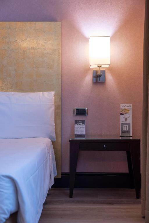 Postel nebo postele na pokoji v ubytování Hotel Nord