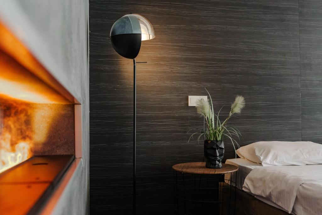 Postel nebo postele na pokoji v ubytování Arkadia Beach Hotel