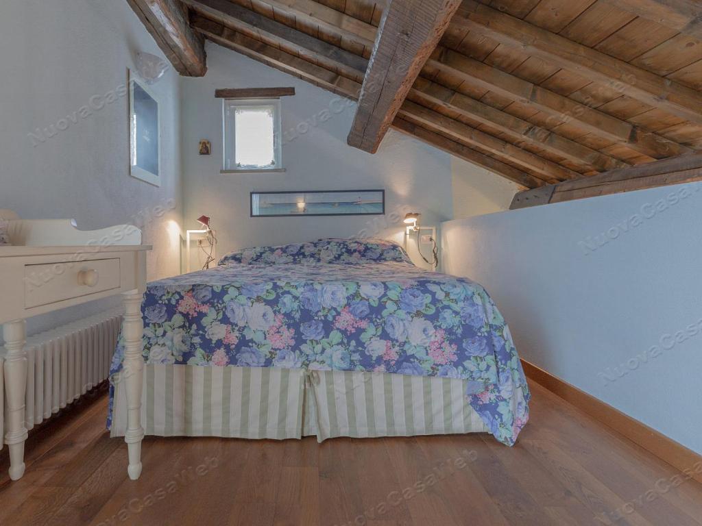 Кровать или кровати в номере la casa tra gli ulivi