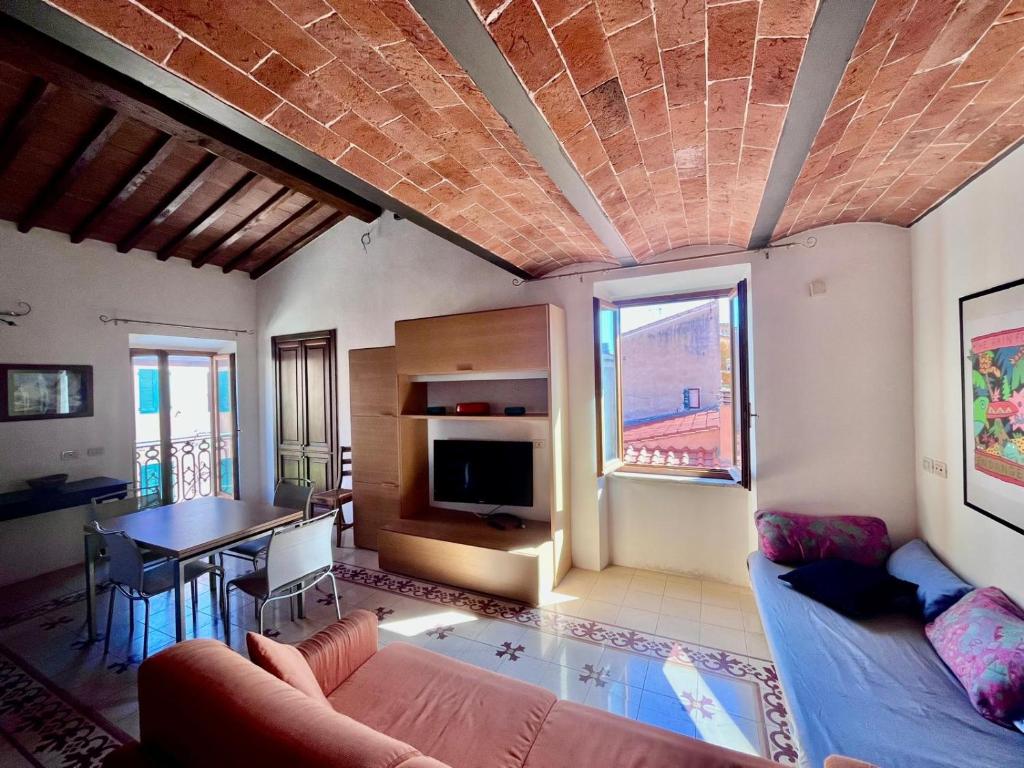 TV a/nebo společenská místnost v ubytování L'Antica Dimora - Elba Affitti