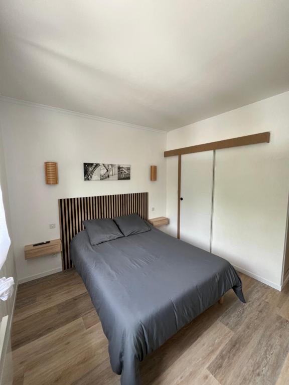 Postel nebo postele na pokoji v ubytování Complexe les 4 saisons