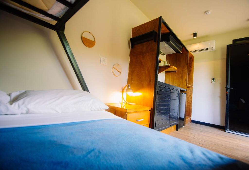 Una cama o camas en una habitación de Wao Jungle Venao