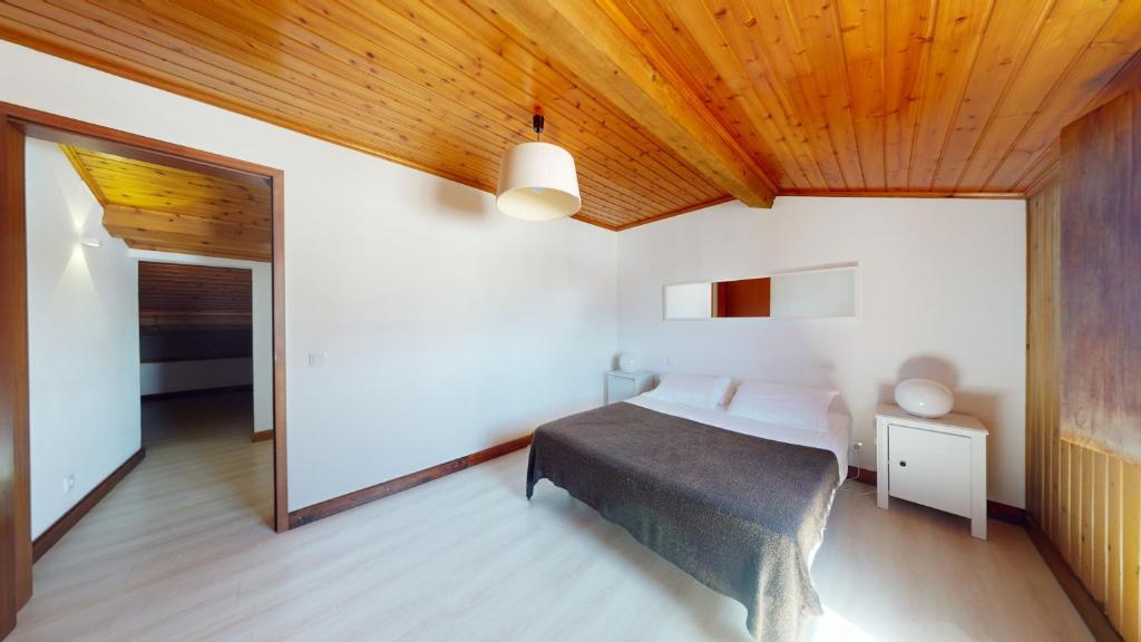 Postel nebo postele na pokoji v ubytování AZORES PEDRA APARTMENTS j - F