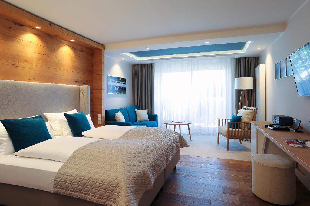 Postel nebo postele na pokoji v ubytování MICHELS Wellness- & Wohlfühlhotel