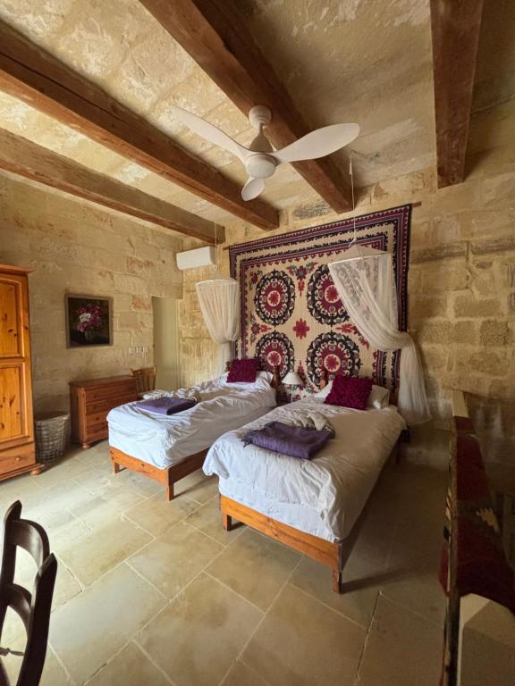 Una cama o camas en una habitación de House of Character - Room with a Pool view